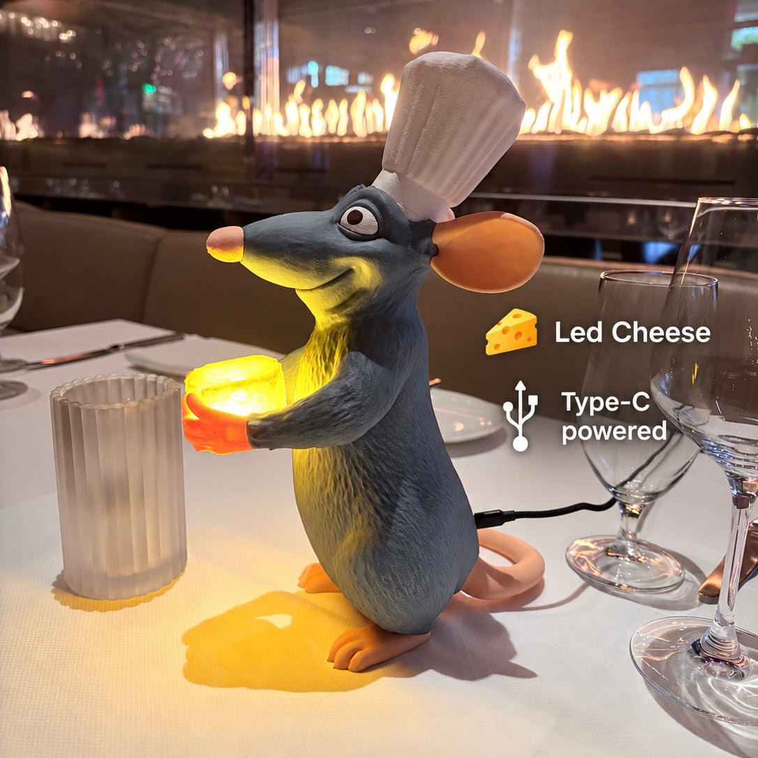 The Rat Light holding its warm glowing LED cheese